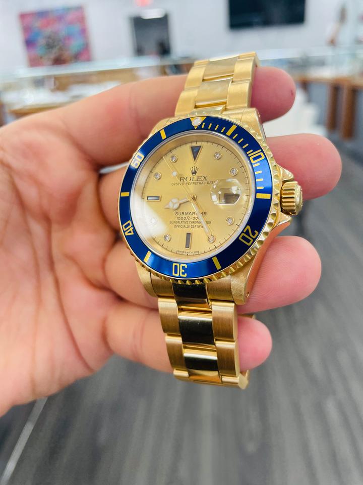 Rolex Submariner Date 16618 Factory Serti Diamond Dial Blue Bezel 18K Yellow Gold