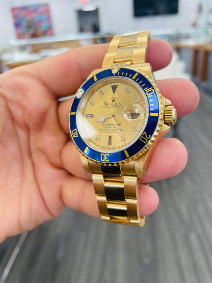 Rolex Submariner Date 16618 Factory Serti Diamond Dial Blue Bezel 18K Yellow Gold