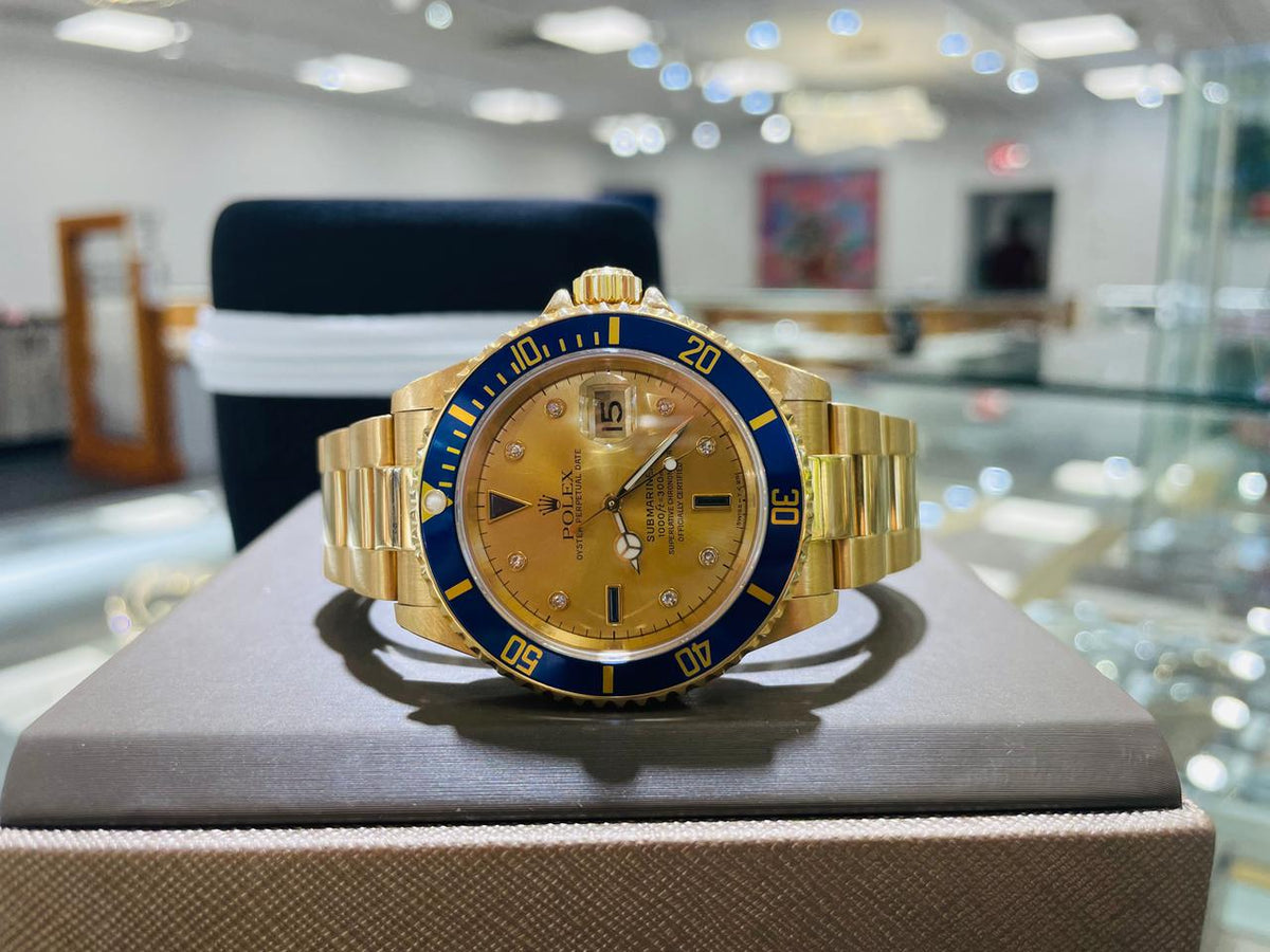 Rolex Submariner Date 16618 Factory Serti Diamond Dial Blue Bezel 18K Yellow Gold