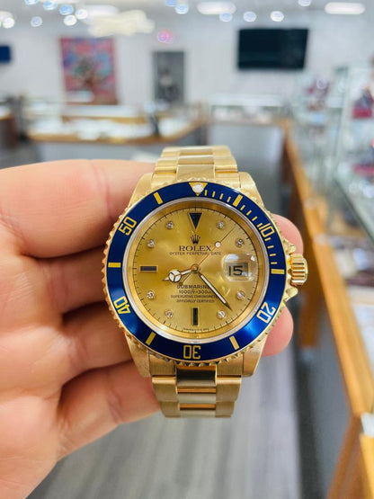 Rolex Submariner Date 16618 Factory Serti Diamond Dial Blue Bezel 18K Yellow Gold