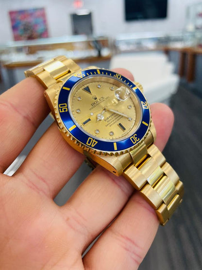 Rolex Submariner Date 16618 Factory Serti Diamond Dial Blue Bezel 18K Yellow Gold