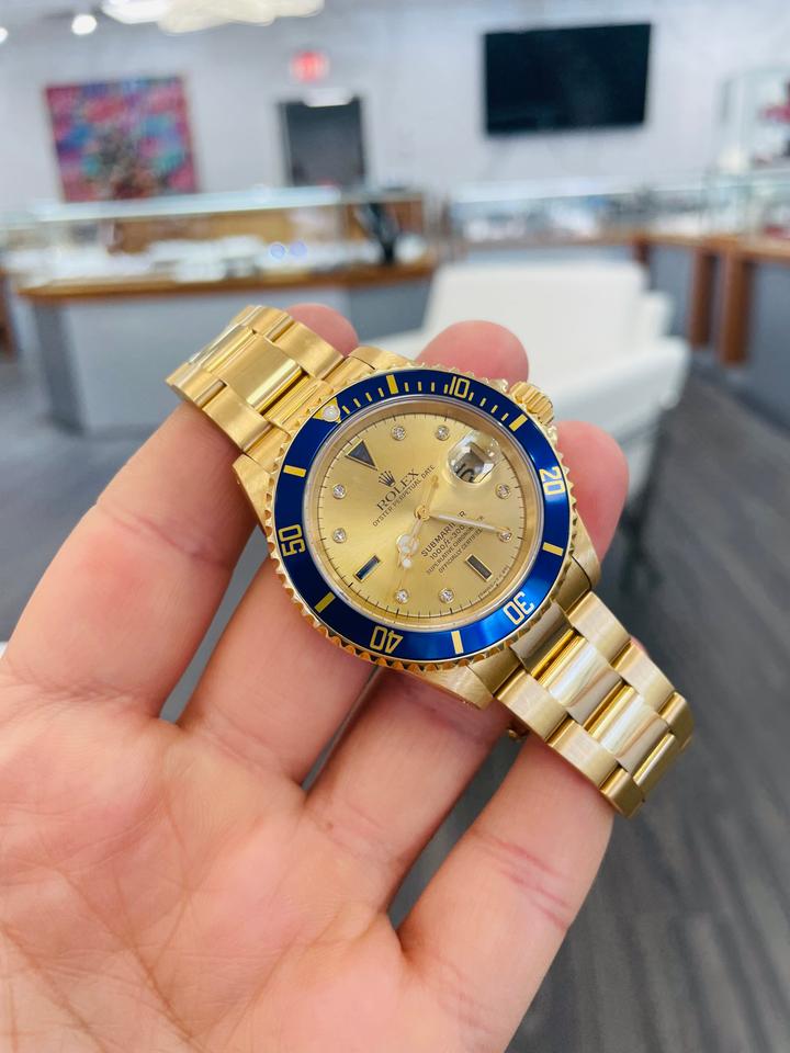 Rolex Submariner Date 16618 Factory Serti Diamond Dial Blue Bezel 18K Yellow Gold