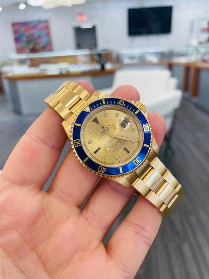 Rolex Submariner Date 16618 Factory Serti Diamond Dial Blue Bezel 18K Yellow Gold