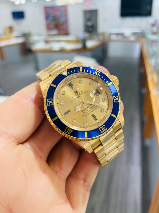 Rolex Submariner Date 16618 Factory Serti Diamond Dial Blue Bezel 18K Yellow Gold